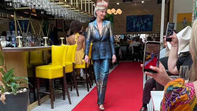 Designer Rosa Isela brought her collection of hats and fascinators to the red carpet - to much acclaim. (Celia Thomson){br}