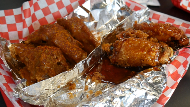 We explore the menu and beginning of Wayne's Wings off Bandera Rd. (Natalie Vargas)