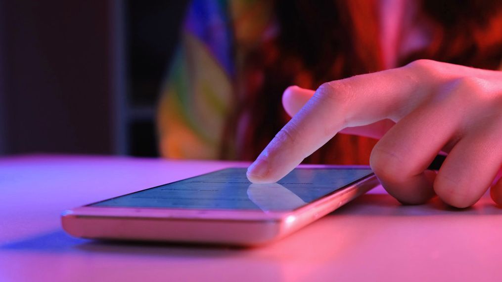Person swipes through smart phone. (FILE)