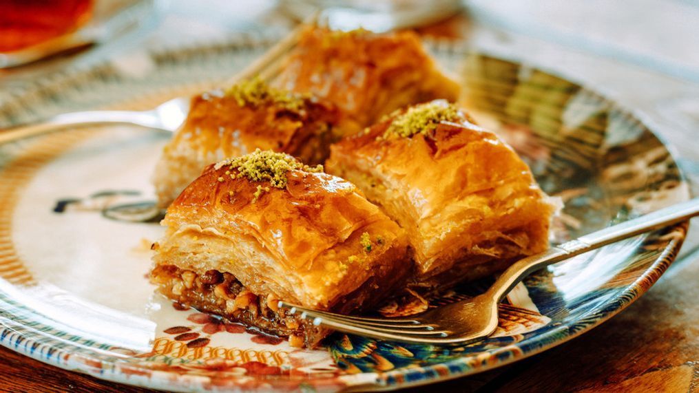 Baklava is often enjoyed with a cup of hot coffee or tea, and it can also be paired with a glass of sweet wine or liqueur. (Getty Images)