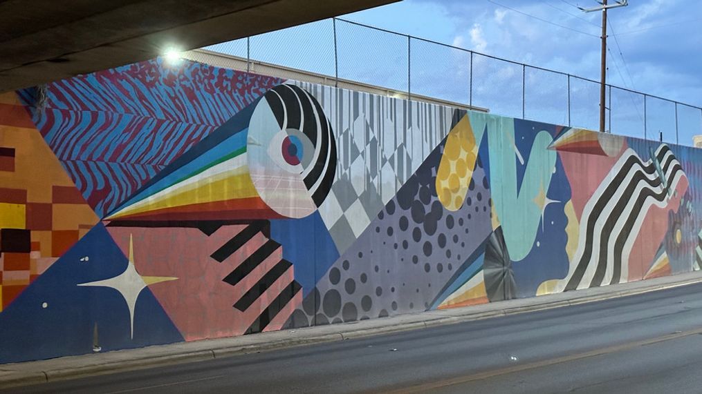 Neon Drive: Artist Iker Muro's 300-foot mural lights up Nolan Street underpass in San Antonio (SBG/ Emilio Sanchez)