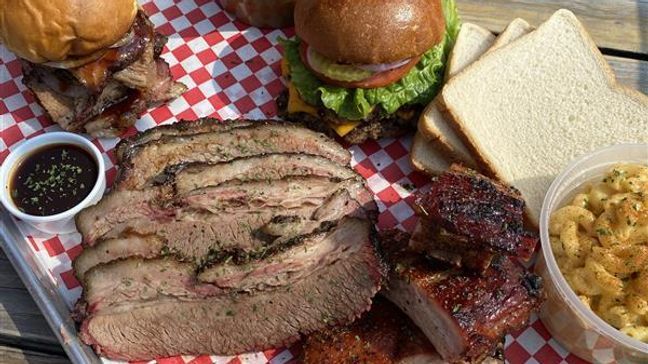 Brisket, ribs, Smash Burger, brisket sandwich, beans, potato salad, and mac and cheese.